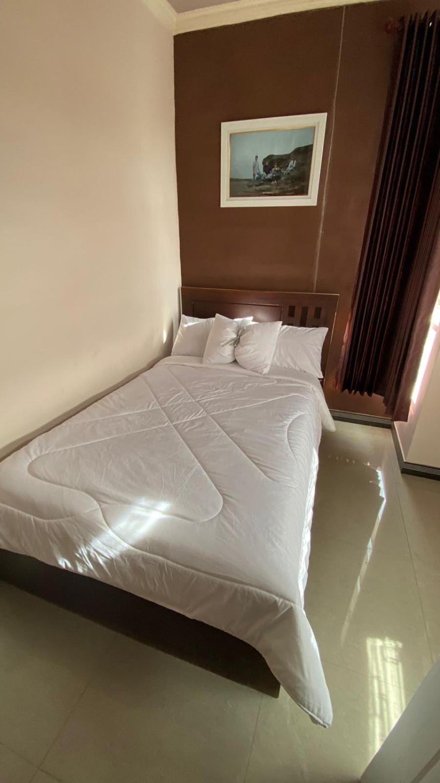 Gigafa Homestay Проболинго Экстерьер фото
